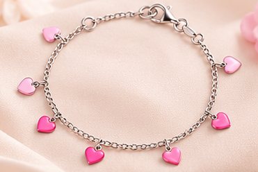 Zilveren armbandje met roze hartjes